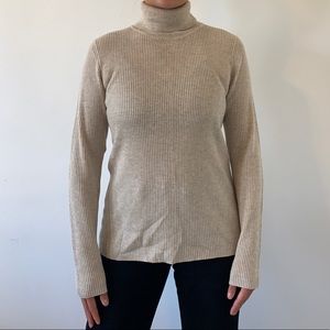 GU // light tan turtle neck sweater